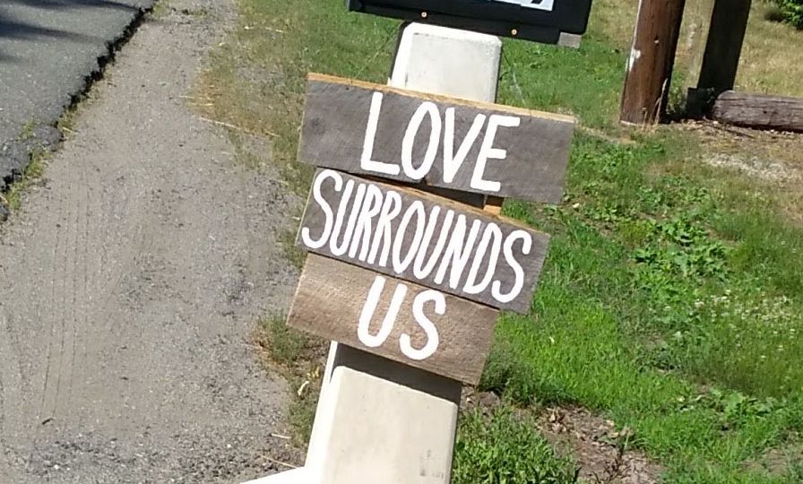 Sign-love-surrounds-us